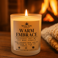 Candle labeled 'Warm Embrace' by Speak Now Candles