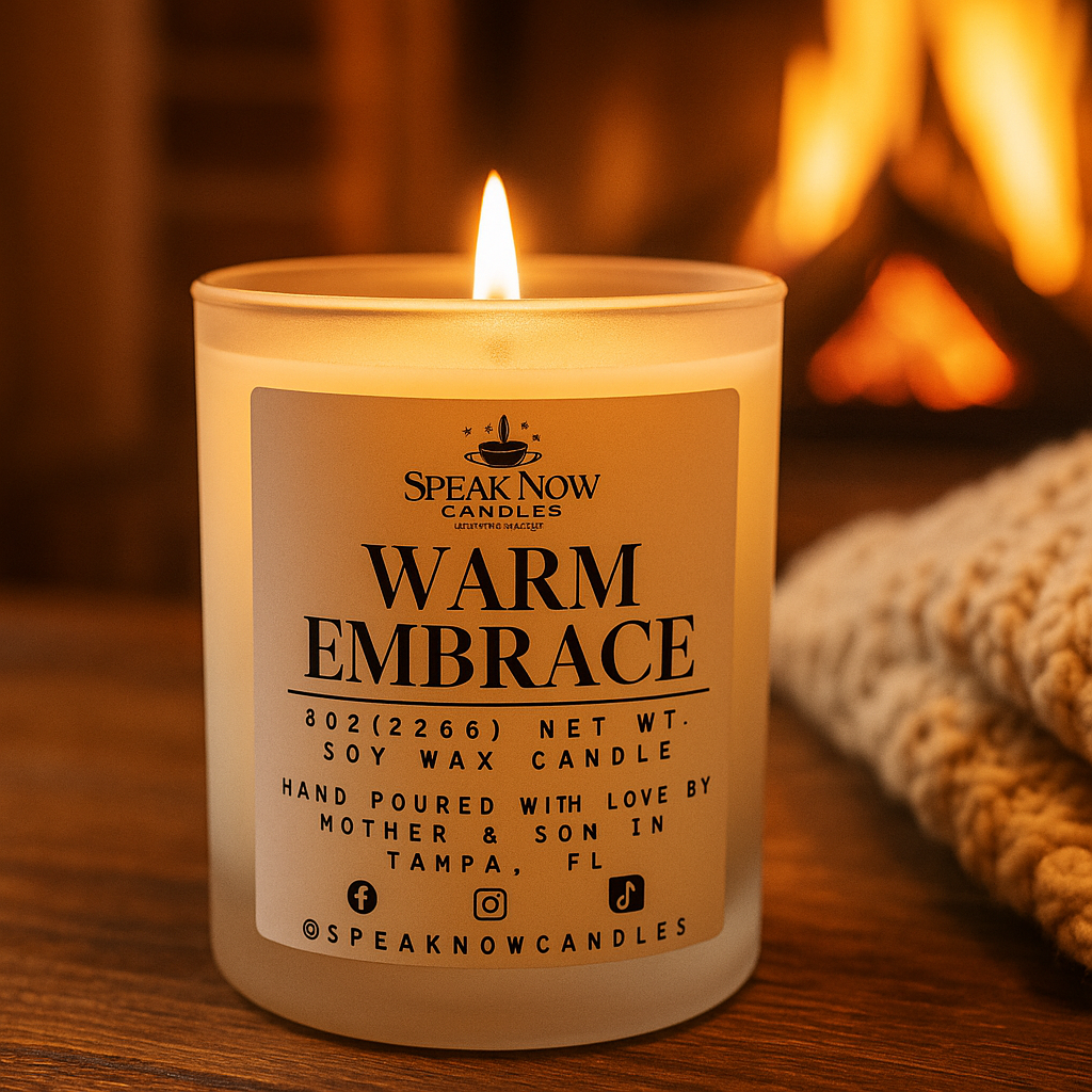 Candle labeled 'Warm Embrace' by Speak Now Candles